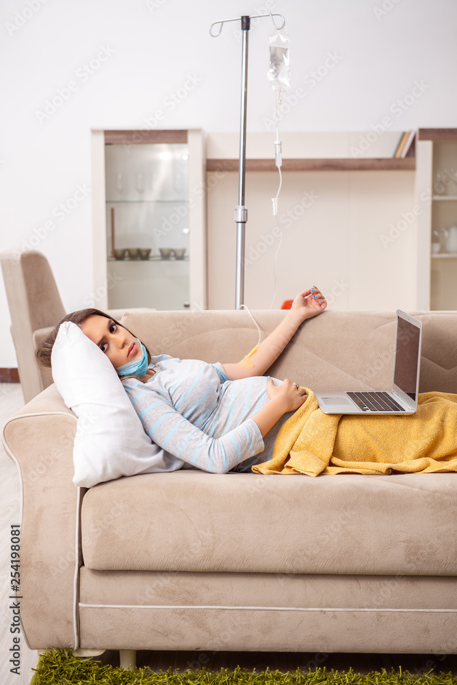Sick pregnant woman suffering at home Sick pregnant woman suffering at home