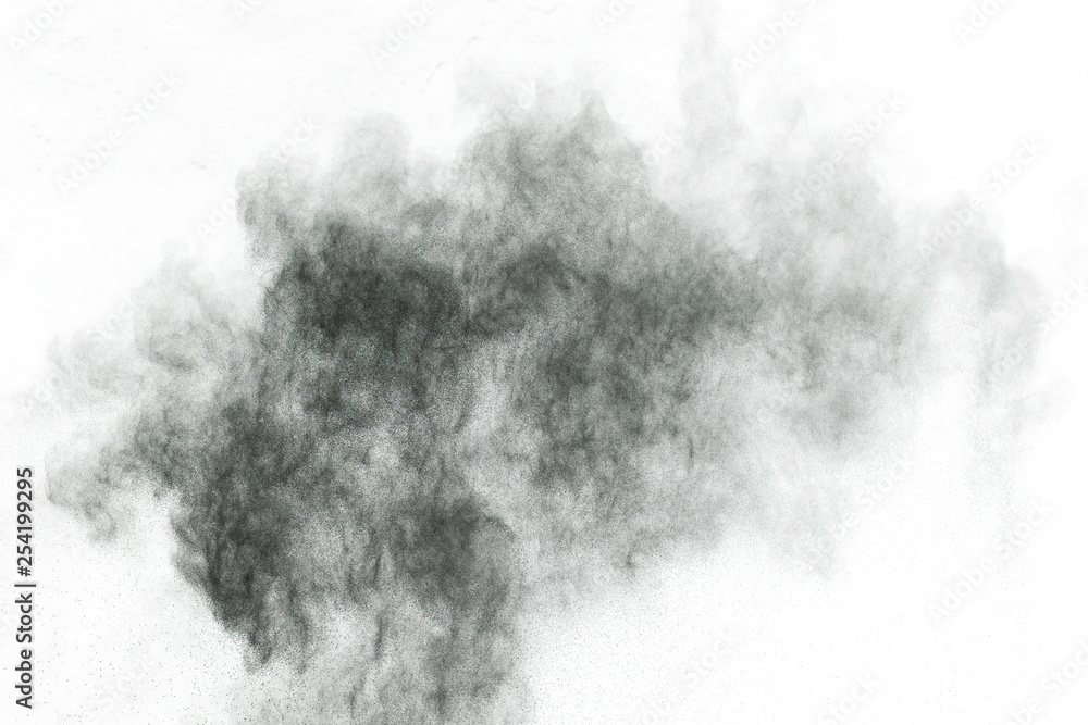 particles of charcoal on white background,abstract powder splatted on white background,Freeze motion of black powder exploding or throwing black powder.