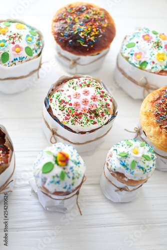 Easter cakes on a white wooden background