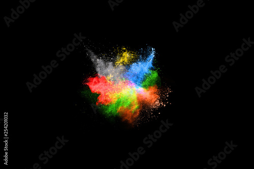 abstract colored dust explosion on a black background.abstract powder splatted background,Freeze motion of color powder exploding/throwing color powder, multicolored glitter texture.