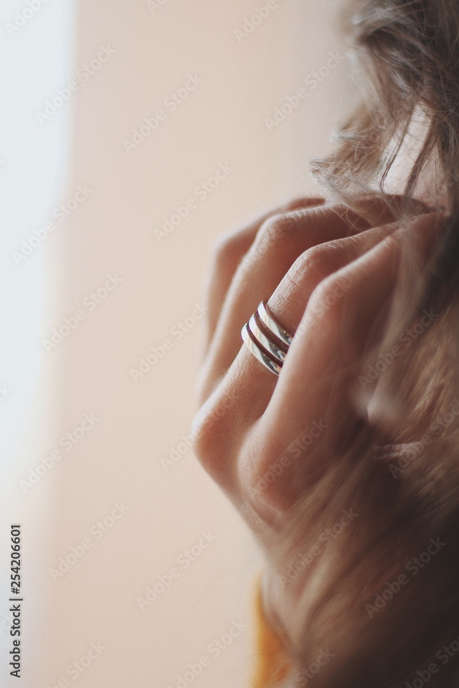 Fototapeta premium complex precious ring on the girl's hand