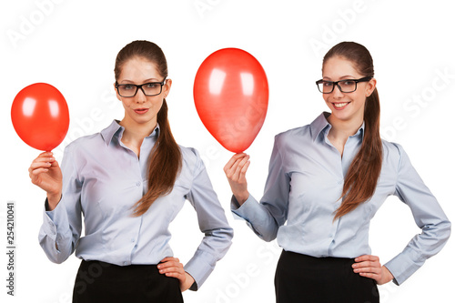 Girl in glasses with inflated red balloon photo