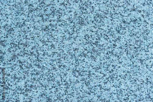 Granite wall with azure or bluish tint as background