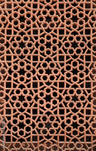 Intricate carving of stone window grill at Humayun's Tomb, built by Hamida Banu Begun in 1565-72, Delhi, India  photo