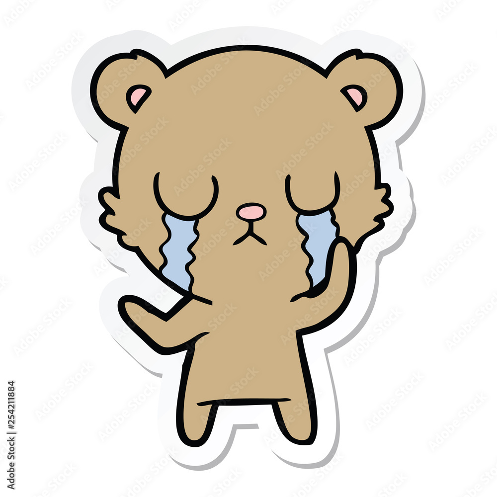 sticker of a crying cartoon bear sticker of a crying cartoon bear
