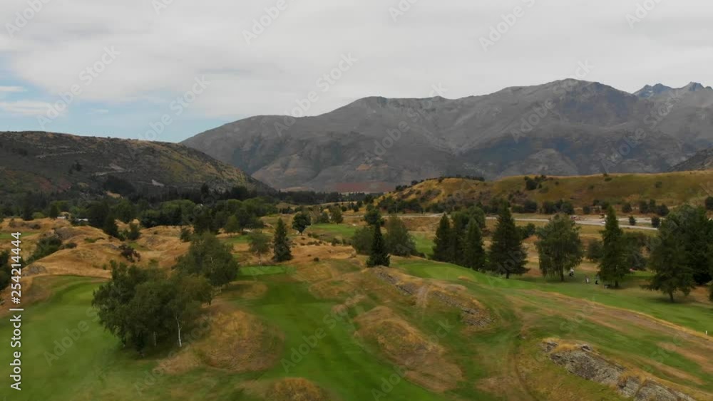 Flying over golf course in New Zealand - Aerial Flying over golf course in New Zealand - Aerial