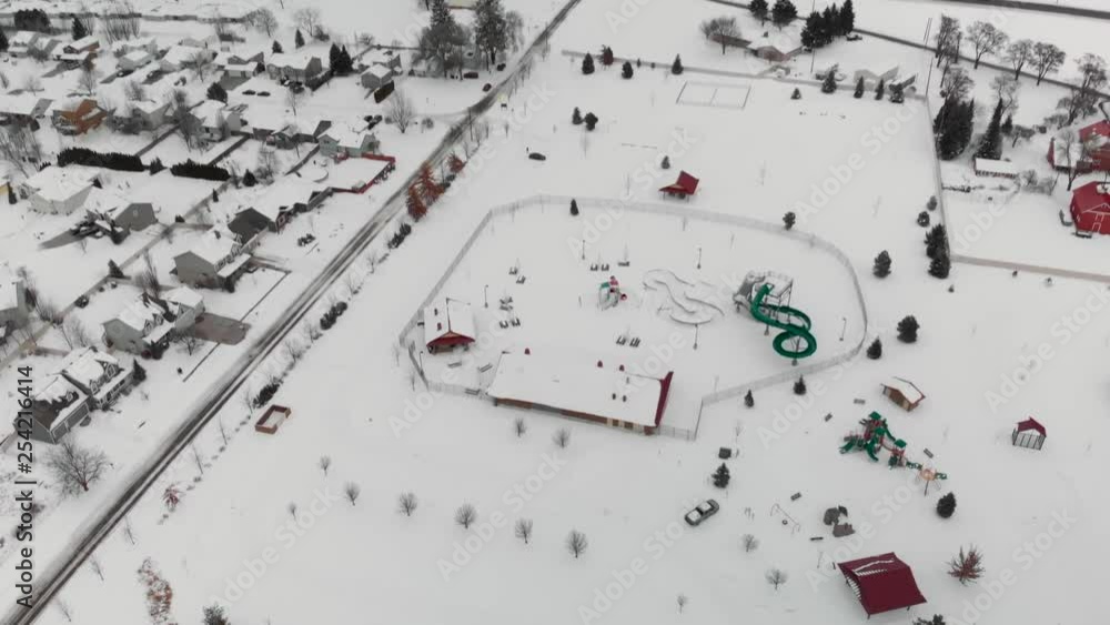 Drone Shot - Snowy landscape. tilt down and back up to reveal water park covered in snow. Spokane, washington near the Palouse and highway 27 Drone Shot - Snowy landscape. tilt down and back up to reveal water park covered in snow. Spokane, washington near the Palouse and highway 27