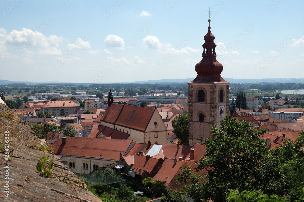 Roofs of old city center and Saint George church in Ptuj, town on the Drava River banks, Lower Styria Region, Slovenia 