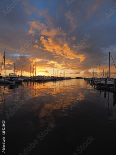 Colorful sunrise after a rainstorm over Dinner Key Marina in Coconut Grove, Miami, Florida.