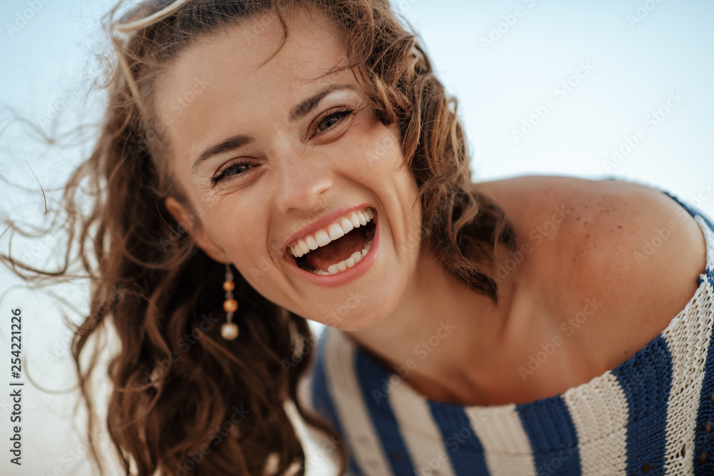 Portrait of happy young woman at summer outdoors Portrait of happy young woman at summer outdoors