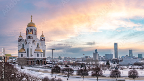 Temple in winter in beautiful pink sunset light. Temple-on Blood, Yekaterinburg, Russia photo