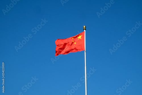 Flag of China on the mast in Tiananmen Square in Beijing, China