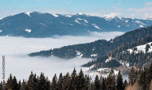 Panorama of Snow Mountain Range Landscape with Blue Sky from ski resort Gerlitzen, Austria. © Сергій Вовк