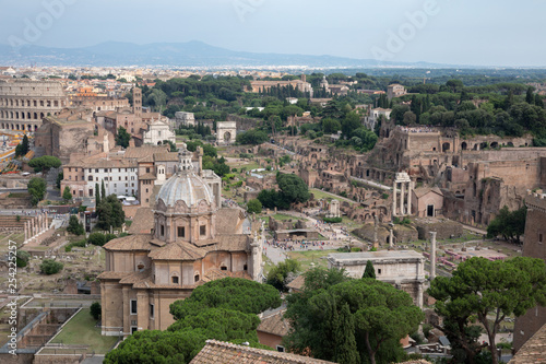 Panoramic view of city Rome with Roman forum and Colosseum from Vittoriano