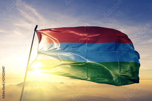 Photos Karelia Republic of Russia flag waving on the top sunrise mist fog