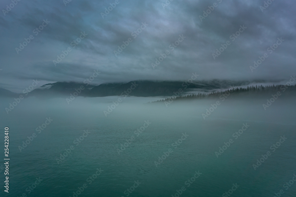 Clouds and mist over the forest and water in Prince Williams