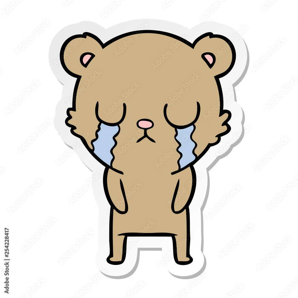 distressed sticker of a cartoon bear crying