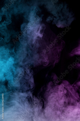 Colorful smoke on black background