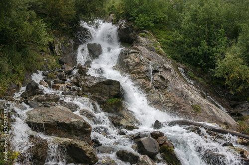 Closeup view waterfall scene in mountains  national park of Dombay  Caucasus