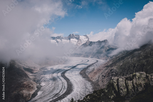 Panorama of mountains scene  walk through the great Aletsch Glacier