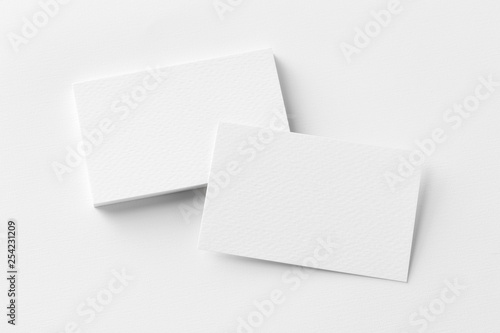 Photo of business cards stack. Template for branding identity. Isolated with clipping path. photo
