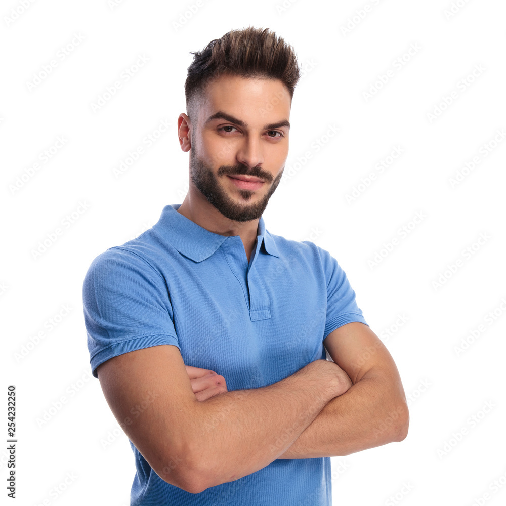 Portrait of a good-looking man wearing a blue polo Portrait of a good-looking man wearing a blue polo