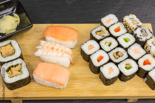 variations of sushi rolls with maki, nigiri and california rolls