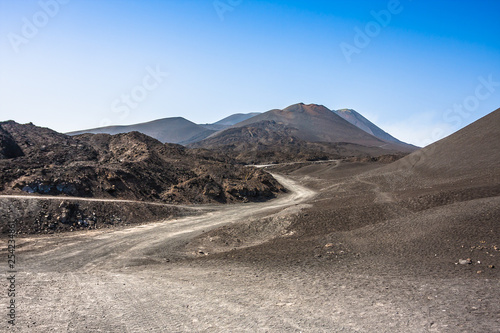 Mountain road on Etna volcano. Mount Etna landscape. Sicily, Italy