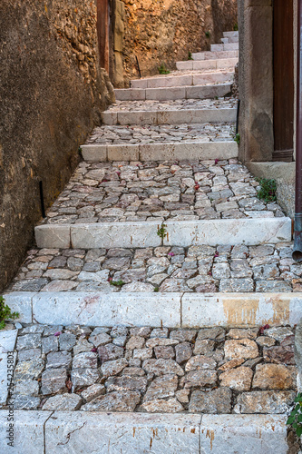 Stone steps to rustic house in old city