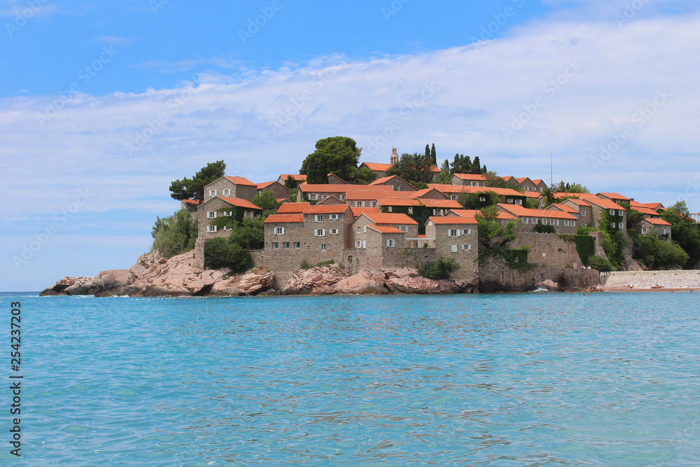 Sveti Stefan island in a beautiful summer day, Montenegro