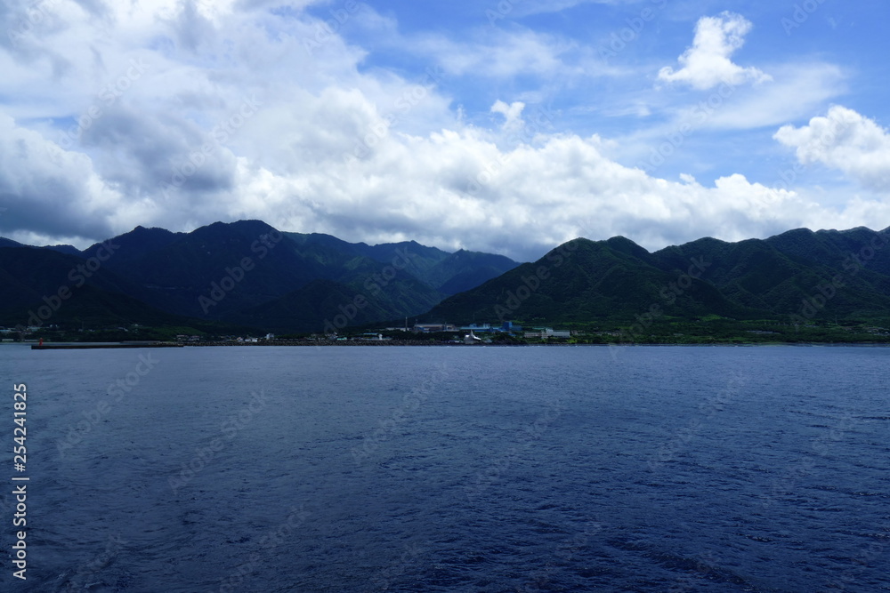 Beautiful primeval island Yakushima seen from the boat, Kyushu, Japan Beautiful primeval island Yakushima seen from the boat, Kyushu, Japan