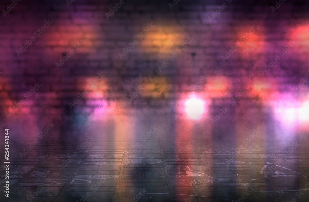 Empty scene background. Empty brick wall, concrete floor, spotlight, multicolored neon rays, bokeh.