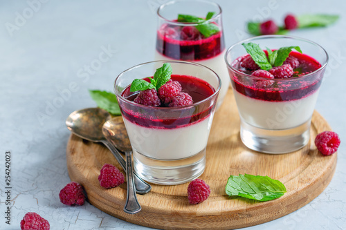 Vanilla Panna cotta with raspberry and mint.