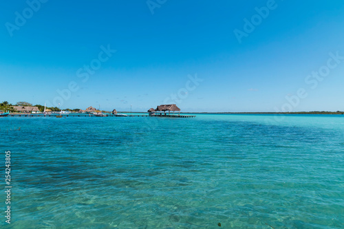 Beautiful Laguna Bacalar. Pavilion with thatched roof,in Quintana roo Mexico © @Nailotl