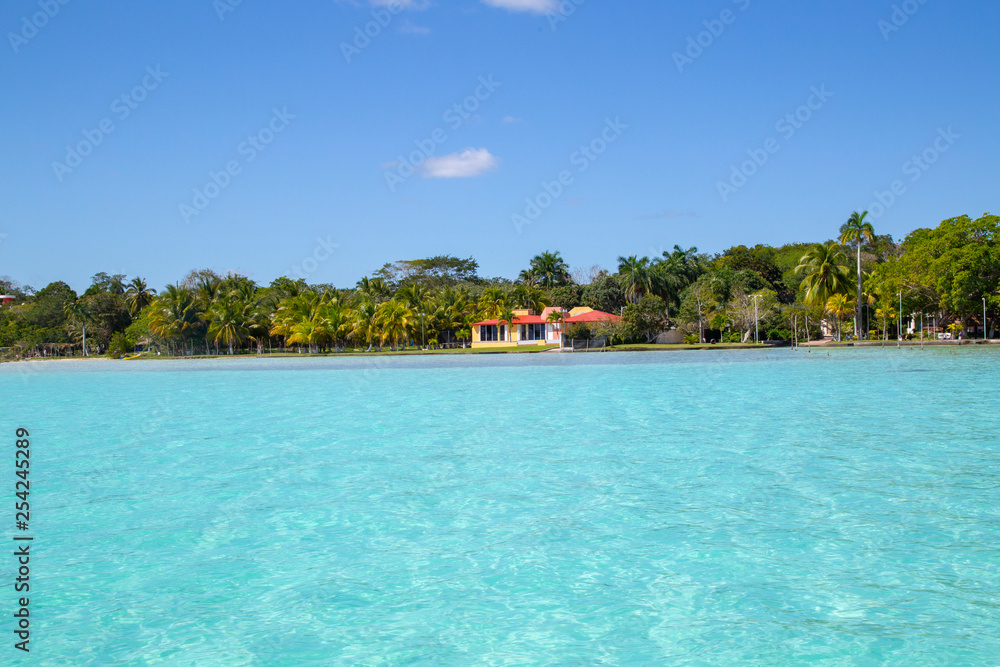 houses and hotels on the shore of the Bacalar lagoon (lagoon of the seven colors) Quintana Roo Mexico