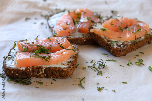 sandwiches with salmon and rye bread
