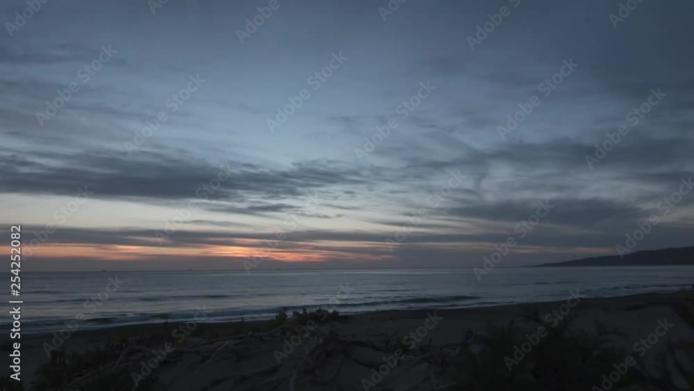 Sunset time lapse (motion) on the beach. Sunset time lapse (motion) on the beach.