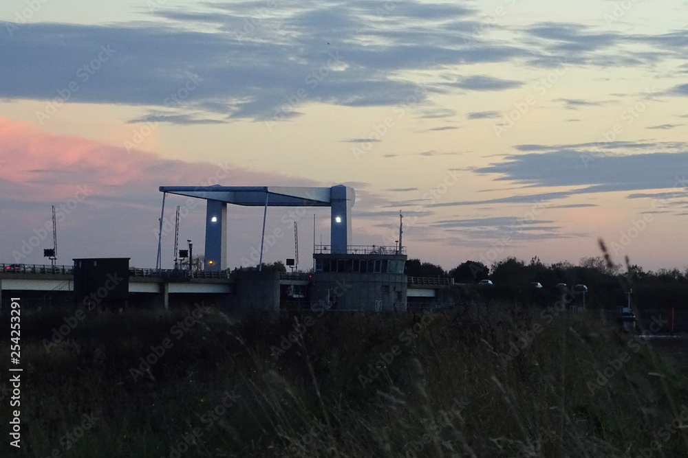 Sunset landscape of Breydon Water and bridge, Great Yarmouth, Norfolk, England, UK Sunset landscape of Breydon Water and bridge, Great Yarmouth, Norfolk, England, UK
