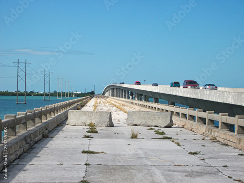 a closed bridge over the water photo