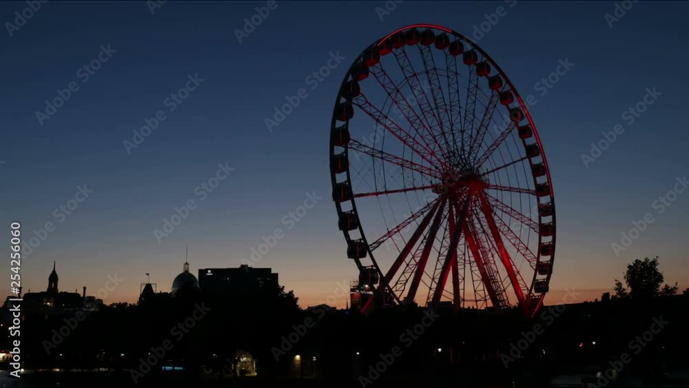 Evening timelapse of Montreal tourist attraction observation wheel Evening timelapse of Montreal tourist attraction observation wheel