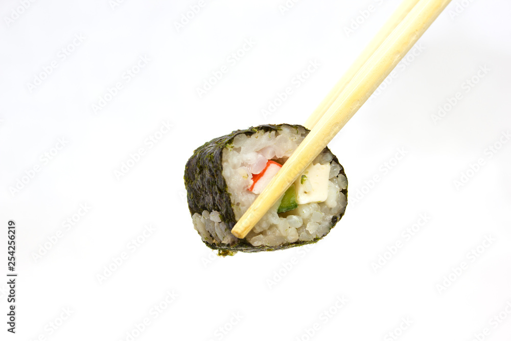 Japanese cuisine, rice sushi and fish - closeup Japanese cuisine, rice sushi and fish - closeup