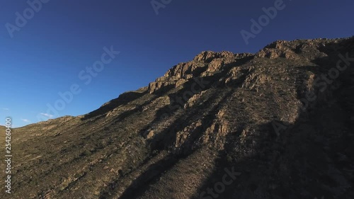 Aerial drone shot of the mountains of the National Park of Peguin in Chihuahua at sunset. photo