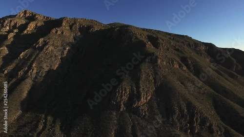 Aerial drone shot of the mountains of the National Park of Peguin in Chihuahua at sunset. photo