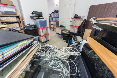 Messy back office desk with...