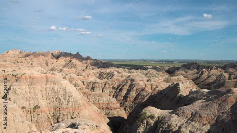 Rock formations under a blue sky at Badlands National Park, South Dakota Rock formations under a blue sky at Badlands National Park, South Dakota