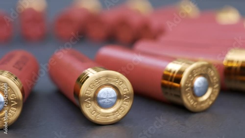 Animation with 20 gauge shotgun shells on a production line. Deadly ammo. Loop. photo
