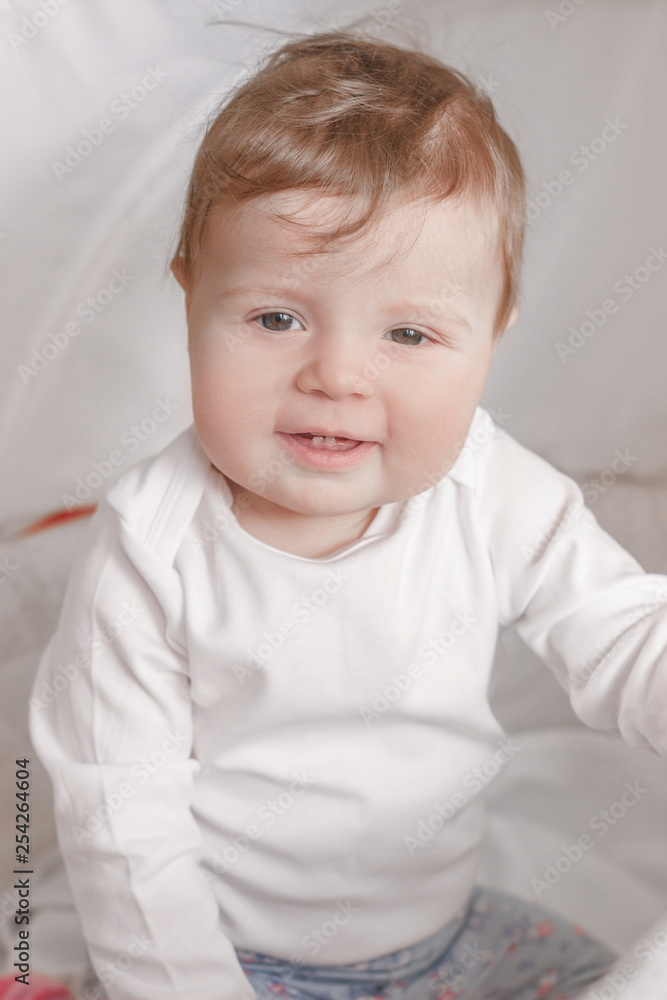 Portrait of joyfil, happiness baby in the bedroom, blurred background Portrait of joyfil, happiness baby in the bedroom, blurred background