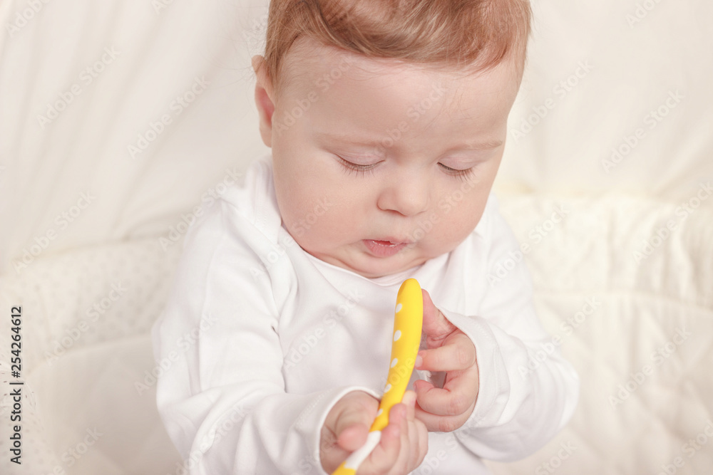 Portrait of joyfil, happiness baby in the bedroom, blurred background Portrait of joyfil, happiness baby in the bedroom, blurred background