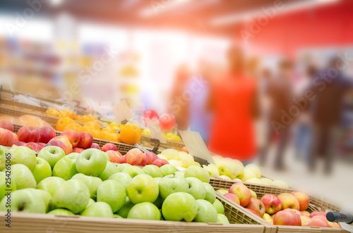 Fresh fruits on shelf in supermarket. Selected focus