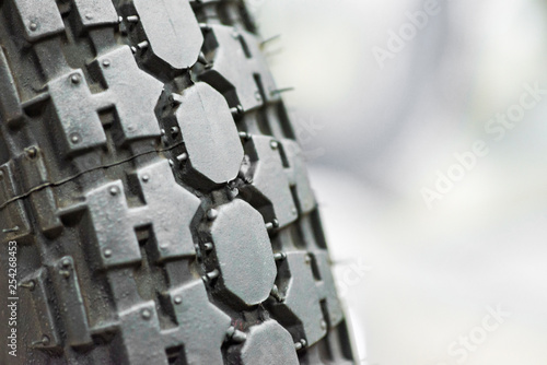 Close-up shot of classical motorcycle tire tread. Close-up protector of tire - wheel service